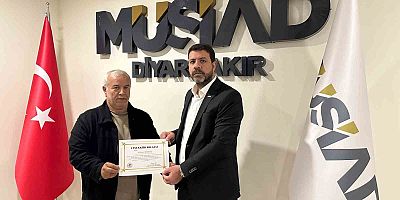 Sokak hayvanlarına verdiği destekten dolayı MÜSİAD Başkanı Bozkuş’a teşekkür plaketi